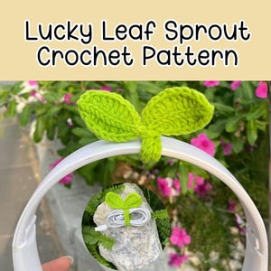 May include: A green crocheted leaf sprout pattern for a headphone cable organizer. The pattern is shown on a white headband and a white cable organizer.