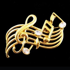 Louis Vuitton LV Symphony Brooch Gold Metal