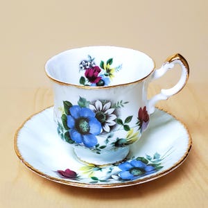 Paragon Cup and Saucer Set Floral Fine Bone China Fancy Teacup VINTAGE England Fancy Footed By Appointment to Her Majesty The Queen Pottery