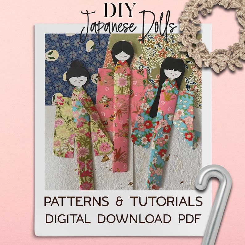 May include: Three DIY Japanese dolls made from patterned paper. The dolls are wearing traditional kimonos with floral designs. The image includes the text "DIY Japanese Dolls" and "PATTERNS & TUTORIALS DIGITAL DOWNLOAD PDF".