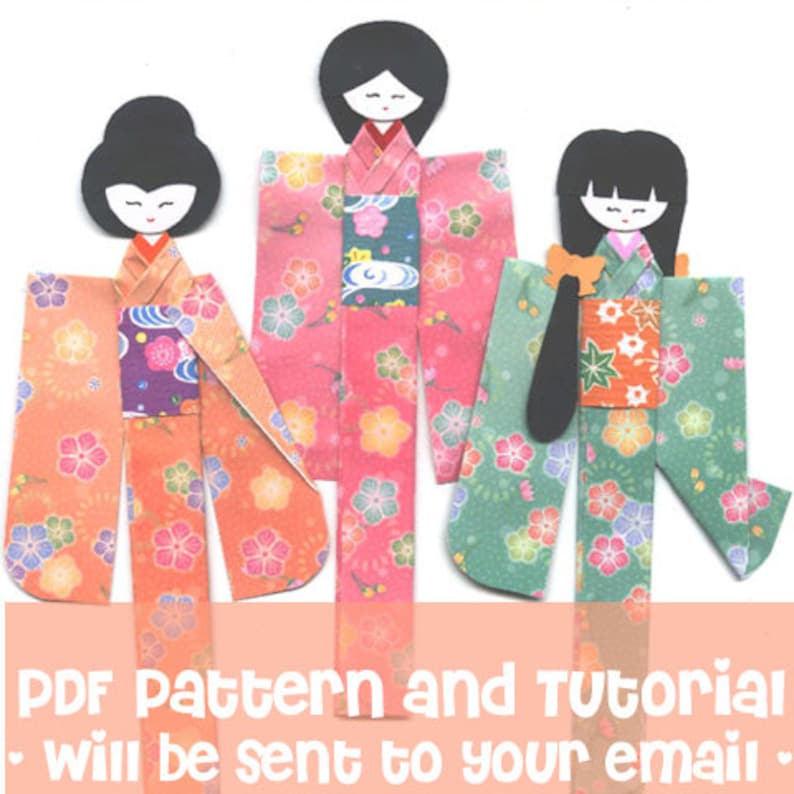 May include: Three paper dolls dressed in colorful kimonos with floral patterns. The dolls have black hair and are wearing traditional Japanese clothing. PDF pattern and tutorial will be sent to your email.