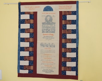 Quilted Wall Hanging in Red, White & Blues Featuring Vintage ‘Ben Franklin Sugar’ Sack
