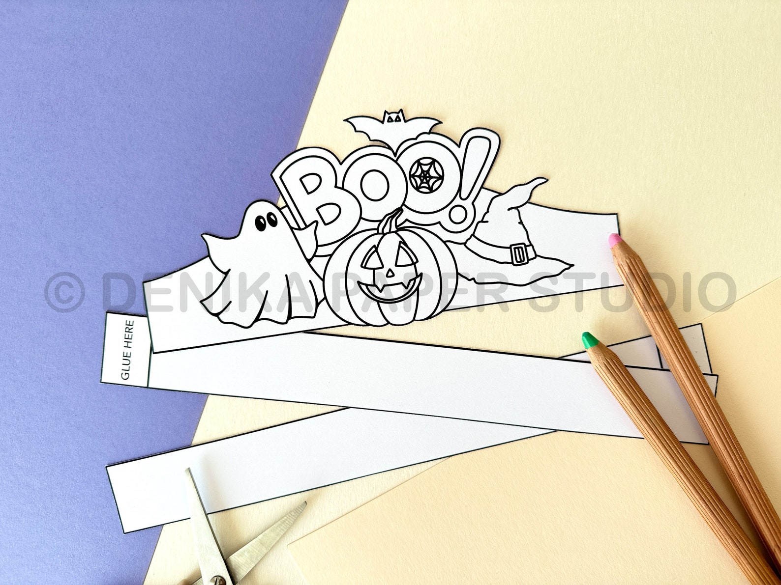 A BOO Lettering Crown to Color Unassembled paper crown with BOO lettering, ghost, pumpkin and witch details.