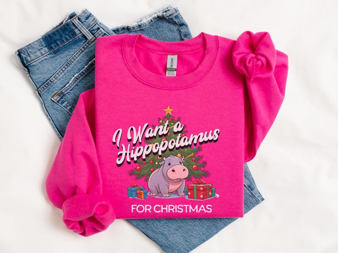 Christmas Festive Cartoon Hippopotamus With A Holiday Theme The Hippo Is Wearing Red Santa Hat 386041379