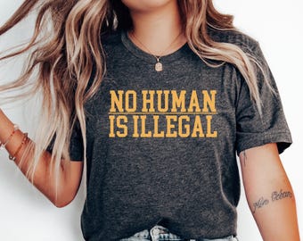 Camiseta unisex "Ningún ser humano es ilegal", camiseta de protesta, camiseta antirracismo, camiseta antideportación, camiseta de protesta anti-Trump, camiseta ilegal