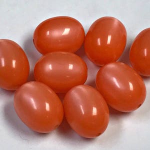 MOONGLOW Beads CORAL color Vintage oval 16mm pkg8 res456