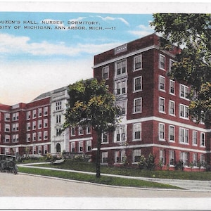 May include: A vintage postcard depicting Couzen's Hall, Nurses' Dormitory at the University of Michigan in Ann Arbor, Michigan. The postcard shows a red brick building with multiple windows and a large tree in the foreground.