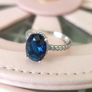 輝くブルーのステートメントハローリング、女性用リング、ファッションジュエリー、彼女へのギフト、925スターリングシルバー