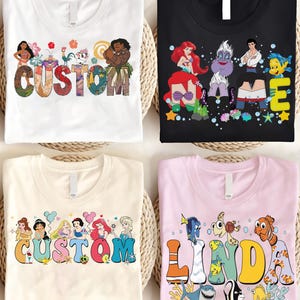 K&ouml;nnte beinhalten: Vier T-Shirts mit farbenfrohen Grafikdesigns. Ein wei&szlig;es T-Shirt mit dem Wort "CUSTOM" und Disney-Figuren. Ein schwarzes T-Shirt mit Disney-Figuren und dem Wort "ME". Ein cremefarbenes T-Shirt mit Disney-Prinzessinnen und dem Wort "CUSTOM". Ein rosa T-Shirt mit Meeresbewohnern und dem Namen "LINDA".