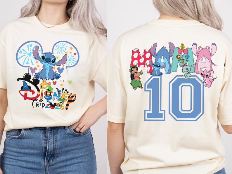 May include: A cream-coloured t-shirt with a blue Stitch character design, fireworks, and the text "Disney Trip". The back of the shirt shows the word "MAMA" with Disney characters and the number "10" in blue.