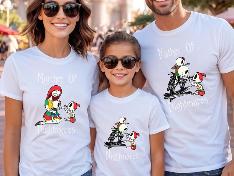 May include: White t-shirts with matching graphics and text. The shirts feature characters from The Nightmare Before Christmas. The text on the shirts reads "Mother of Nightmares" and "Father of Nightmares".