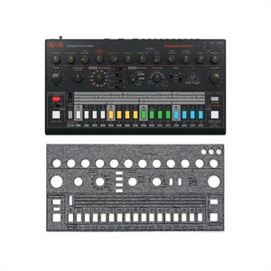 May include: Black RD-78 analog drum machine with multiple knobs, buttons, and a row of colored pads. The text "RD-78 Computer Controlled Analog Drum Machine" is printed on the top. A gray felt cover is below the drum machine.