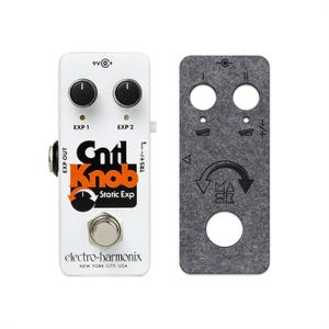 May include: A white Electro-Harmonix Cntl Knob Static Exp guitar pedal with two black knobs, a silver footswitch, and orange and black text. Beside it is a grey felt overlay with cutouts for the knobs and switch, featuring printed icons.