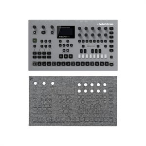 May include: A gray Elektron Analog Four MKII synthesizer with numerous knobs, buttons, and a display screen. Below it is a gray felt cover with cutouts for the controls. The synthesizer has the text "Analog Four MKII" and "Elektron".