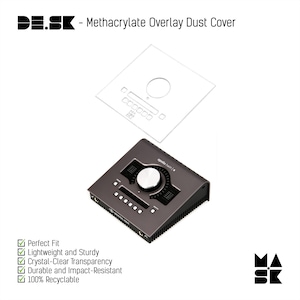 May include: A clear methacrylate overlay dust cover positioned above a dark gray Apollo Twin audio interface. The cover features cutouts for the central knob and buttons. Text includes DE.SK - Methacrylate Overlay Dust Cover and a list of features including Perfect Fit, Lightweight and Sturdy, Crystal-Clear Transparency, Durable and Impact-Resistant, and 100% Recyclable.