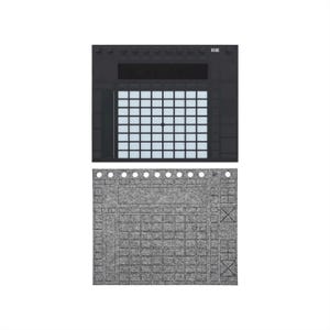 May include: A black electronic music production device with a grid of white squares, positioned above a gray felt pad with a similar grid pattern. The pad has a series of small holes along the top edge.