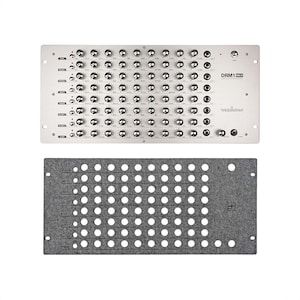 May include: A silver electronic music synthesizer module with numerous knobs and controls, labeled "DRM1 MKIII". Below it is a gray felt panel with multiple circular cutouts. The Verbos Electronics logo is visible.