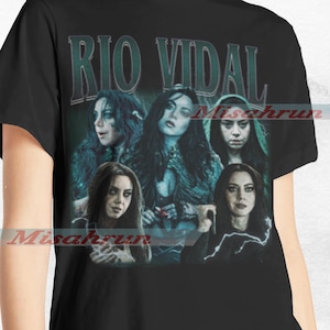 May include: Black t-shirt with a vintage-style graphic of five women with the text "Rio Vidal" in a green and white font.