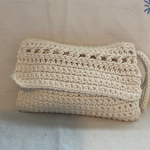 Spring/Summer Crochet Wrist Bag from Willie’s Room.  Cream Cotton Yarn, Wrist Strap, 8 wide by 5 high. Lined with Vintage Handkerchief