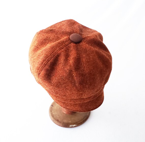 orange newsboy hat