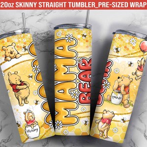 May include: A 20oz skinny straight tumbler wrap featuring a yellow and gold honeycomb pattern with Winnie the Pooh characters. The text "Mama Bear" is written in large, bold letters on the wrap.