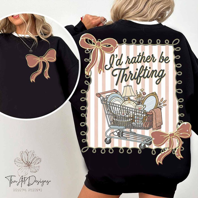May include: Black sweatshirt with a large bow graphic on the front and back. The back features a shopping cart filled with vintage items and the text "I'd rather be thrifting" in a decorative frame.
