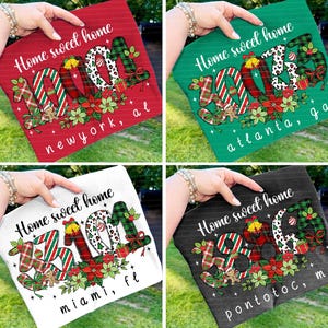 May include: Four t-shirts in red, green, white, and black, each featuring the text "Home sweet home" and the year "2021" in a festive design. The shirts also display city names: New York, Atlanta, Miami, and Pontotoc.