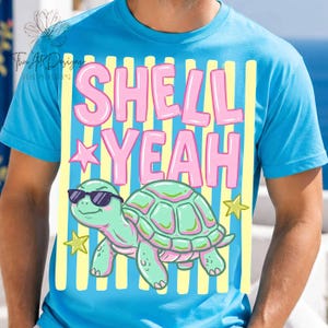 May include: A light blue t-shirt with the words "SHELL YEAH" in pink letters. A cartoon turtle wearing sunglasses is below the text. Yellow vertical stripes and star graphics complete the design.