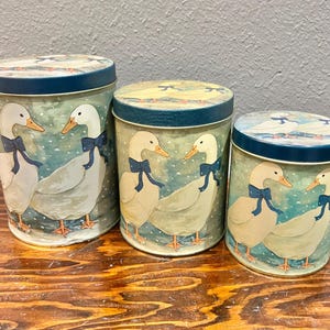 Set of 3 Vintage Geese in Winter Wearing Blue Bows Canister Set With Lids. 3 Sizes. Nesting Tins. Shipping Included!