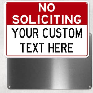 May include: A rectangular metal sign with a red top section featuring the white text NO SOLICITING and a white bottom section with the black text YOUR CUSTOM TEXT HERE. The sign has rounded corners and small mounting holes in each corner.