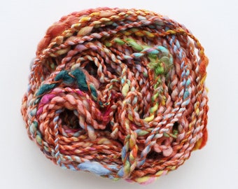hand spun yarn, art yarn, handspun art yarn, wool yarn, boucle yarn, bulky yarn, handspun wool yarn .. juicy juicy