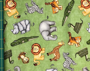 Animal Toss Fabric on light green cotton fabric - 1 yard more available - Quilting Treasures