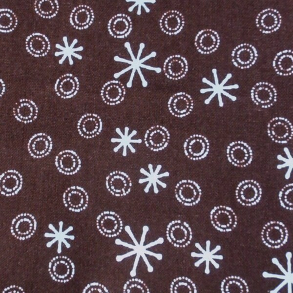 Jacks circles on brown fabric - 1 yard - pale blue