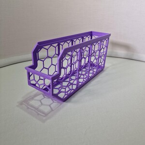 Organize your space with 3D printed storage containers! This digital download includes STL files for customizable hexagon and full wall bins. Perfect for home, workshop, and DIY projects. Create practical, efficient storage solutions with ease.