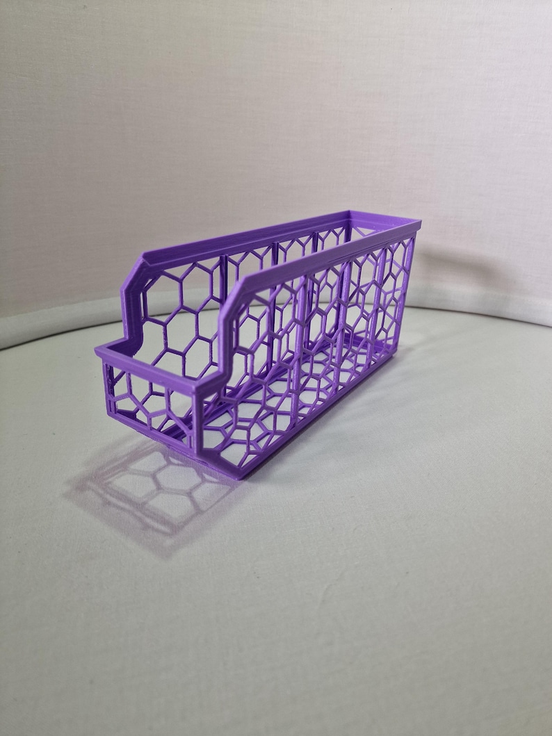 Organize your space with 3D printed storage containers! This digital download includes STL files for customizable hexagon and full wall bins. Perfect for home, workshop, and DIY projects. Create practical, efficient storage solutions with ease.
