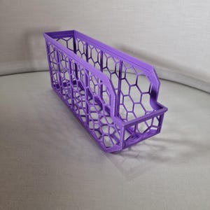 Organize your space with 3D printed storage containers! This digital download includes STL files for customizable hexagon and full wall bins. Perfect for home, workshop, and DIY projects. Create practical, efficient storage solutions with ease.