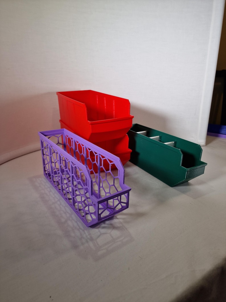Organize your space with 3D printed storage containers! This digital download includes STL files for customizable hexagon and full wall bins. Perfect for home, workshop, and DIY projects. Create practical, efficient storage solutions with ease.
