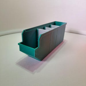 Organize your space with 3D printed storage containers! This digital download includes STL files for customizable hexagon and full wall bins. Perfect for home, workshop, and DIY projects. Create practical, efficient storage solutions with ease.