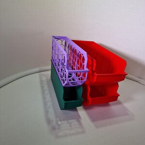Organize your space with 3D printed storage containers! This digital download includes STL files for customizable hexagon and full wall bins. Perfect for home, workshop, and DIY projects. Create practical, efficient storage solutions with ease.
