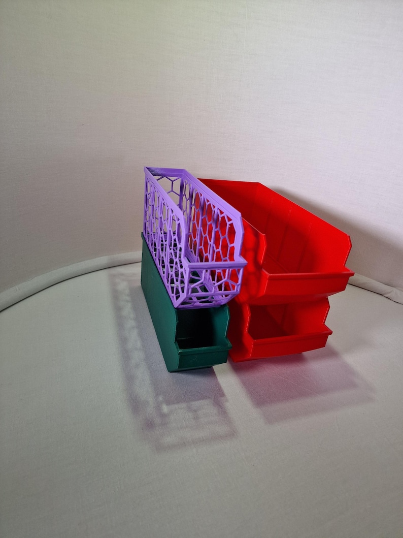 Organize your space with 3D printed storage containers! This digital download includes STL files for customizable hexagon and full wall bins. Perfect for home, workshop, and DIY projects. Create practical, efficient storage solutions with ease.