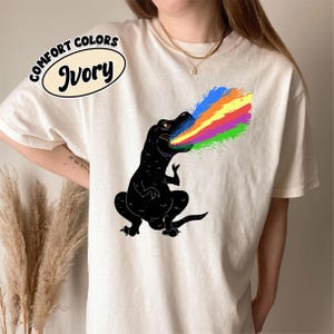 Tyrannosaurus Rex Shooting Rainbow Laser Comfort Colors T-Shirt, Funny Dinosaur Graphic Tee, Rainbow Beam Dino Shirt