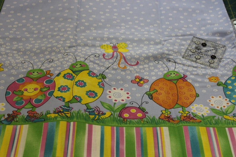 Bright ladybugs  double Border by Lainey Dainels 100/% cotton fabric 42-44 wide by Daisy Kingdom for Springs Ind.