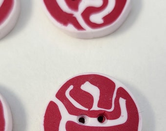 Rorschach pink buttons