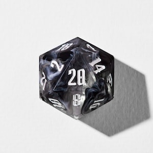 May include: A twenty-sided die with a marbled black and white design. The numbers are white and clearly visible. The die is designed for tabletop role-playing games.