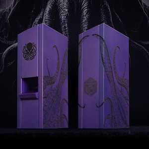 May include: Two purple wooden boxes with intricate black tentacle and symbol designs. One box has a slot, the other a geometric pattern. The background features a dark, shadowy tentacled figure.