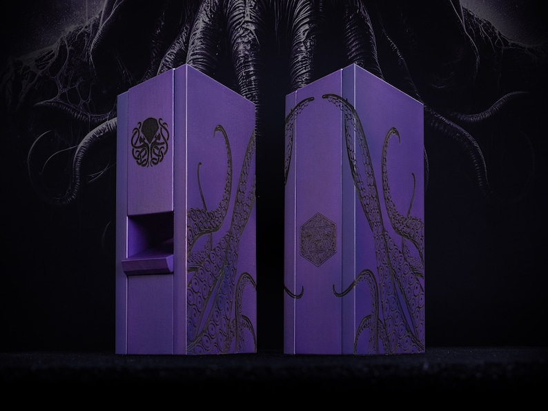 May include: Two purple wooden boxes with intricate black tentacle and symbol designs. One box has a slot, the other a geometric pattern. The background features a dark, shadowy tentacled figure.
