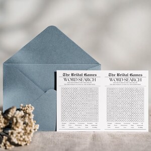 May include: Two printable word search game cards with the title "The Bridal Games Word Search". The cards are printed on white paper and feature a grid of letters with words related to weddings to find.