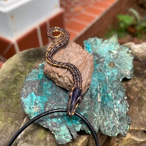 Handmade by Me Goddess Hekate Black an Gold Snake Wire Weave And Iolite Pendant
