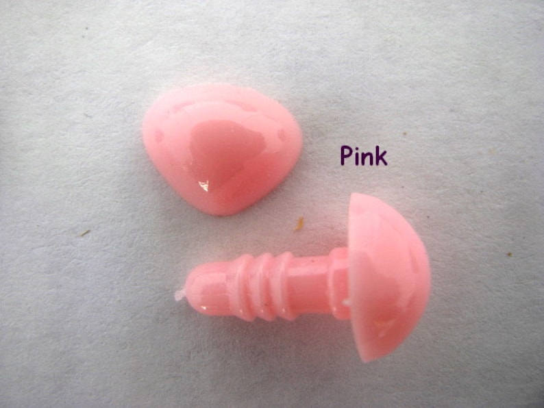 May include: Pink plastic safety eyes for stuffed animals. The eyes are sold in pairs and come with a screw-on back.