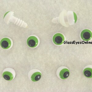 May include: A set of ten green and black plastic safety eyes with white pupils. The eyes are for craft projects and come with two screw-in backs.